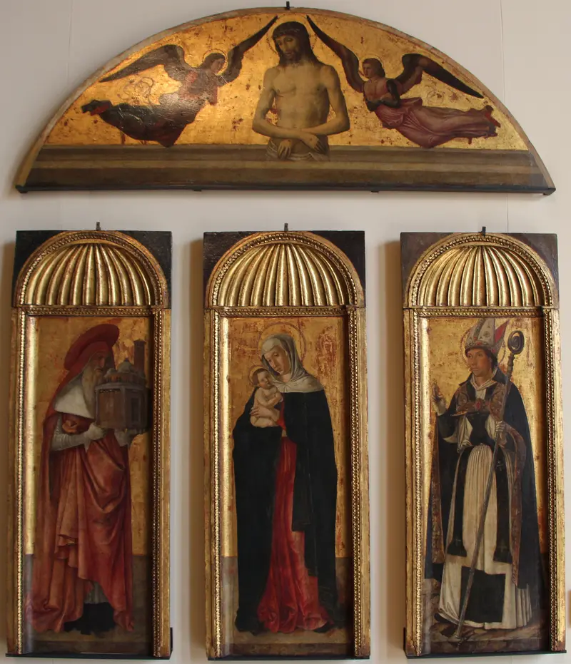 Triptych of the Madonna by Giovanni Bellini, depicting the Madonna with Christ Child and saints.