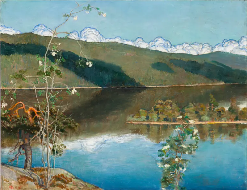 A slender branch with pale blossoms above deep blue water, with hills and thunderclouds in the background.
