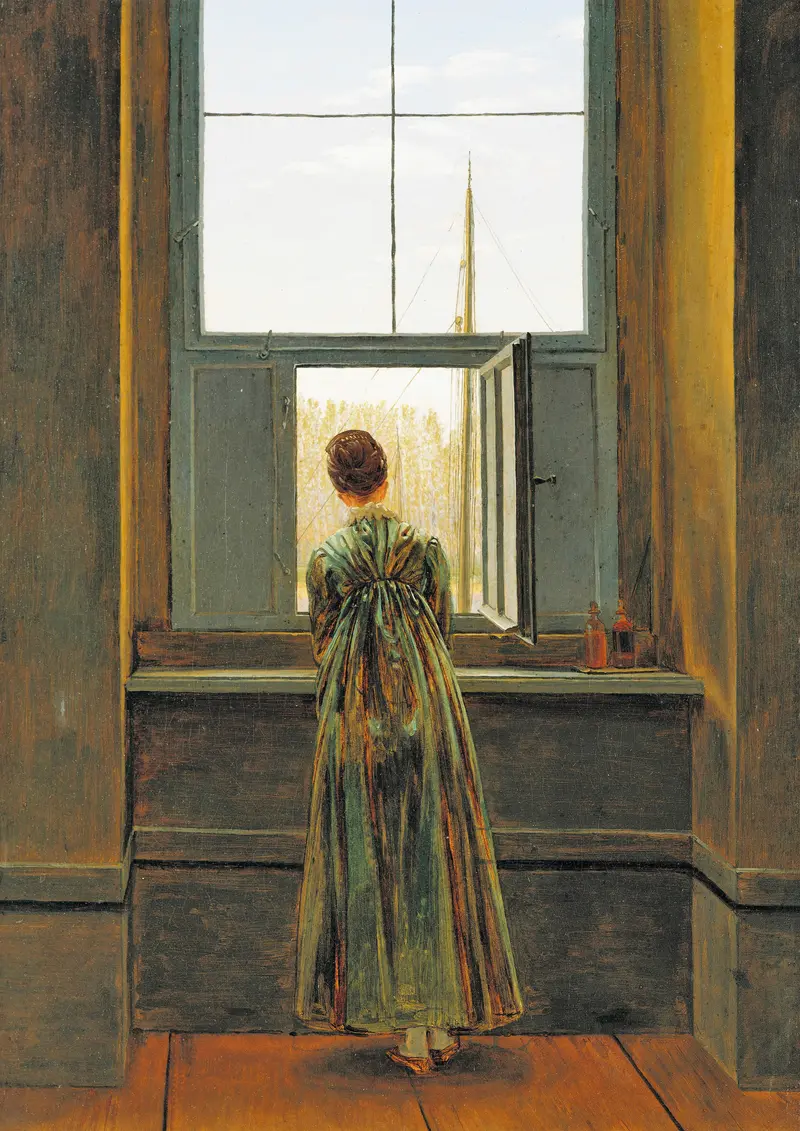 A woman in a green dress stands with her back to the viewer, leaning on a window ledge and looking out at ships and sky.