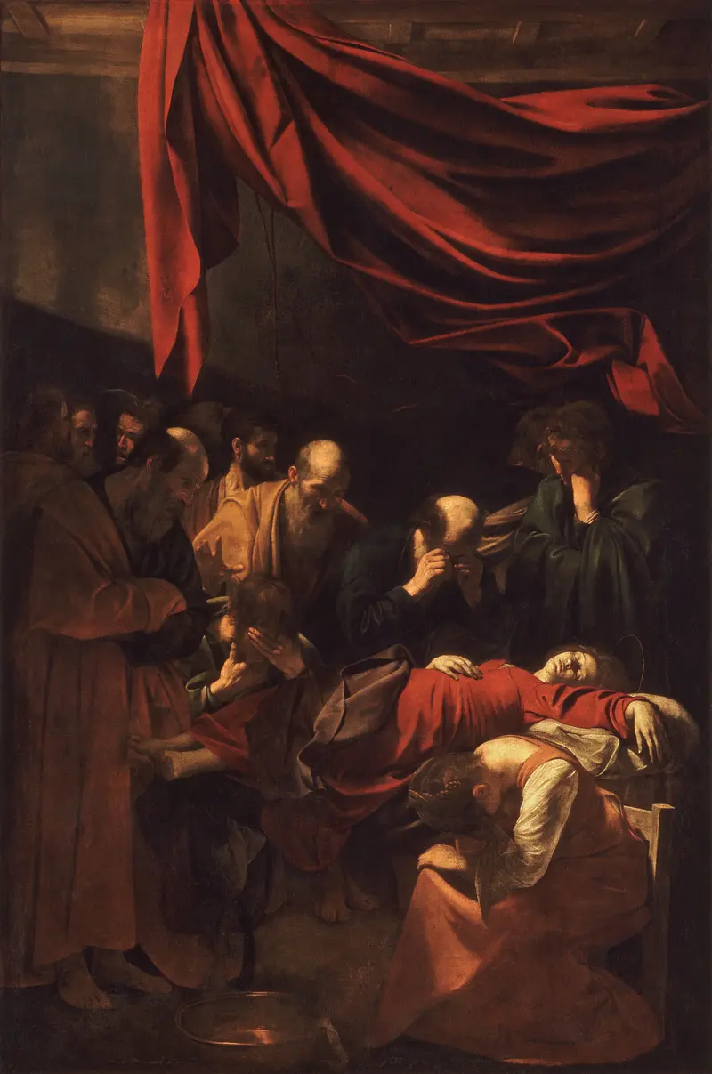 A lifeless Mary in a red robe lies on a bed surrounded by mourners expressing grief under dramatic lighting and red drapery.
