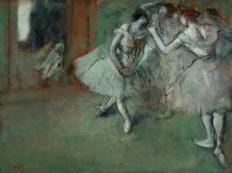 Four ballet dancers in pale tutus cluster closely on the right side of a rehearsal room with a large mirror reflecting a blurred figure in the background.