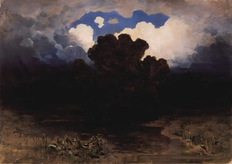 A dramatic landscape with a burst of blue sky and dark silhouettes of trees against a vibrant, illuminated sky.