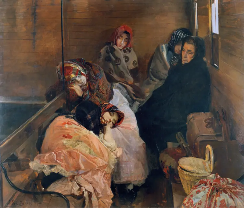 Five women wrapped in shawls sit closely together in a cramped wooden compartment with bundles and luggage around them.