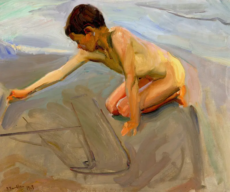 A young child kneels on the shore, drawing sweeping lines in the sand with one arm extended, illuminated by sunlight.