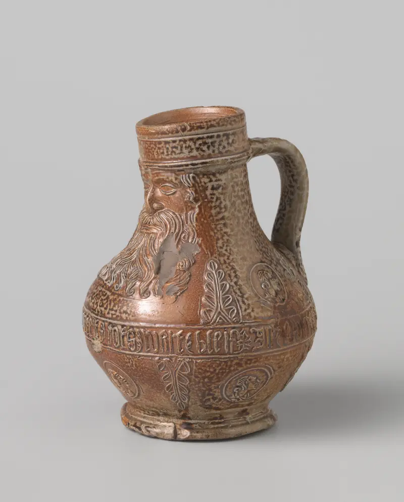 Ceramic jug with portraits and leaves by unknown artist