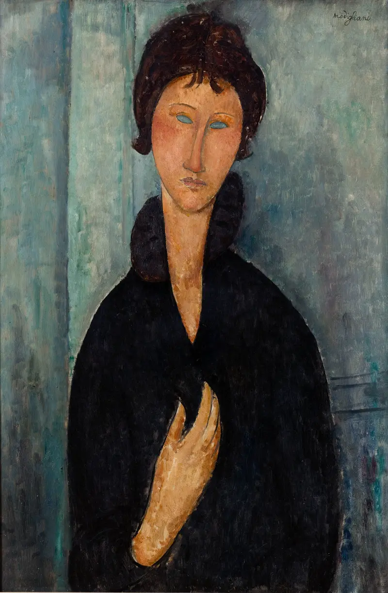 Portrait of a woman with elongated features and pale blue eyes wearing a dark garment against a blue-green background.