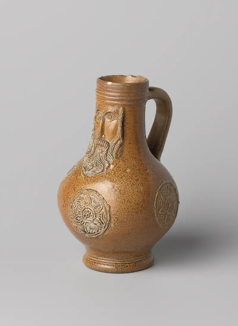 Bartmann jug made of stoneware by unknown artist, featuring intricate medallions.