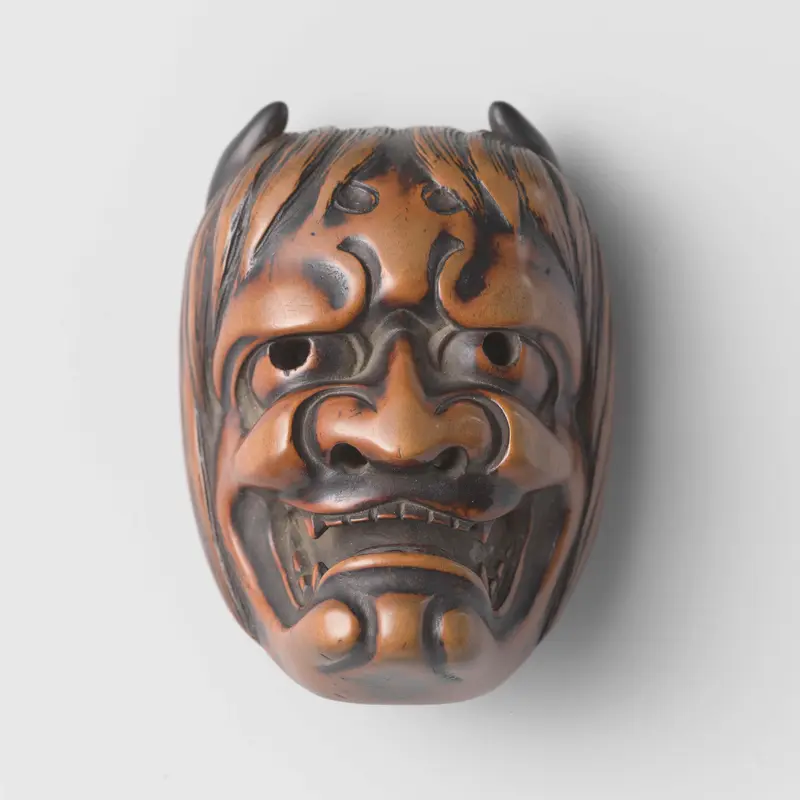 Netsuke carving in wood by unknown artist
