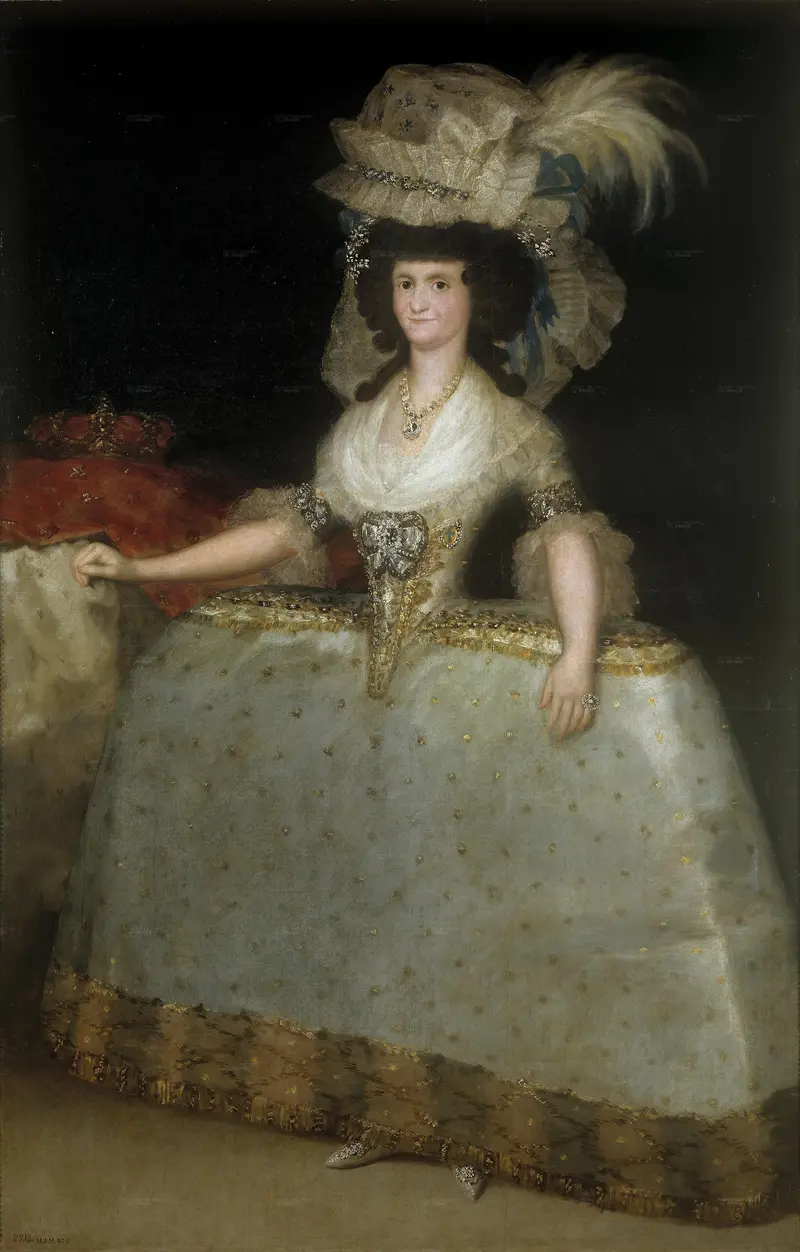 A woman stands wearing a voluminous white gown with gold accents and a large feathered hat, resting her left hand on a red velvet cushion.