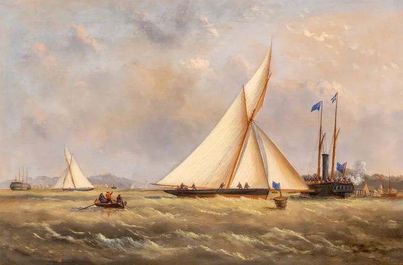 A dynamic cutter sailing through choppy waters with sails taut and crew focused.