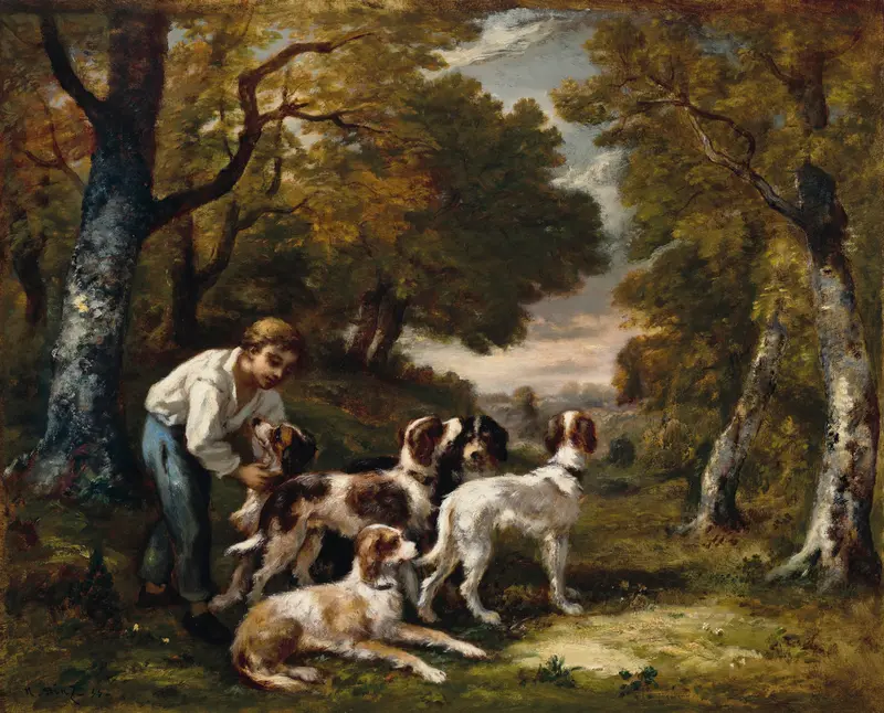 A boy with five dogs in a forest setting.