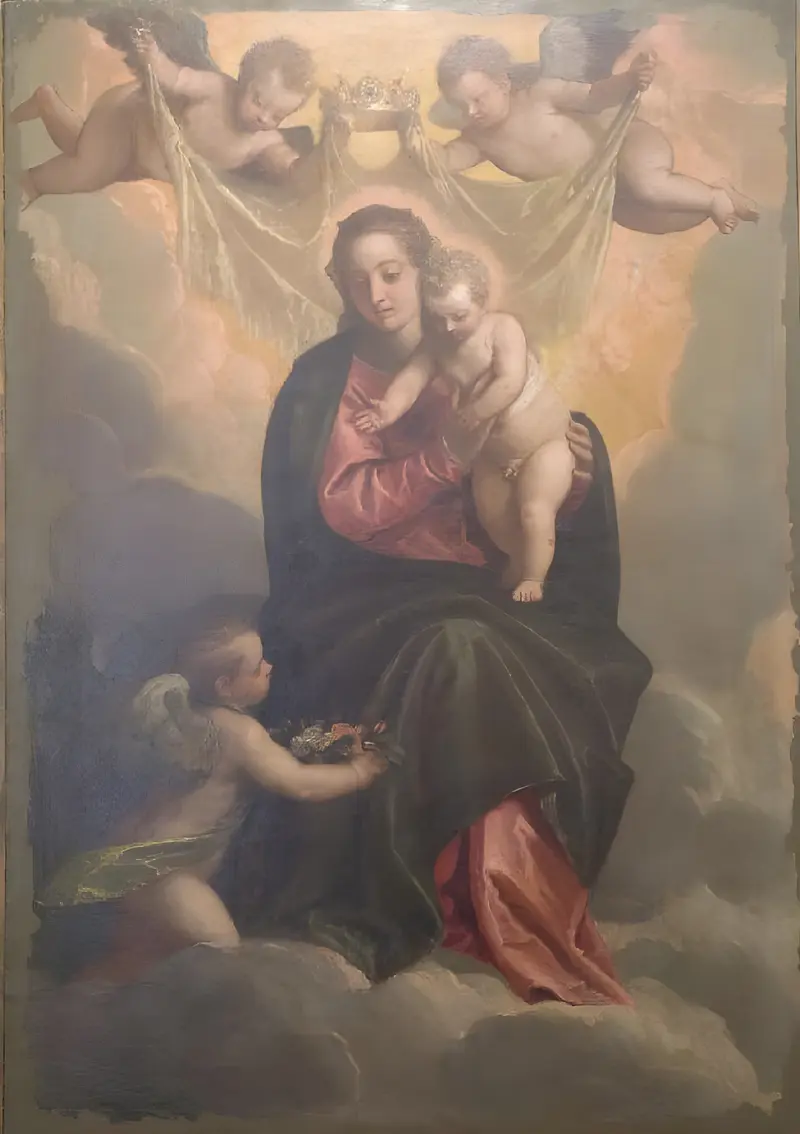 A cropped depiction of Madonna and Child by Paolo Veronese, showcasing rich colors and textures.