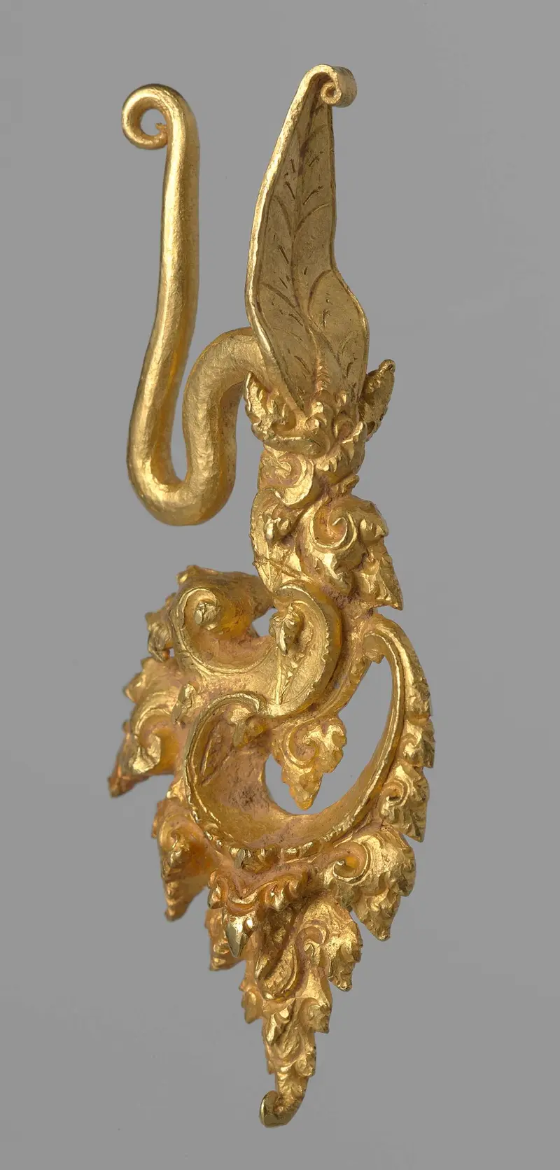 Ear ornament made of metal, showcasing intricate filigree by Unknown Artist