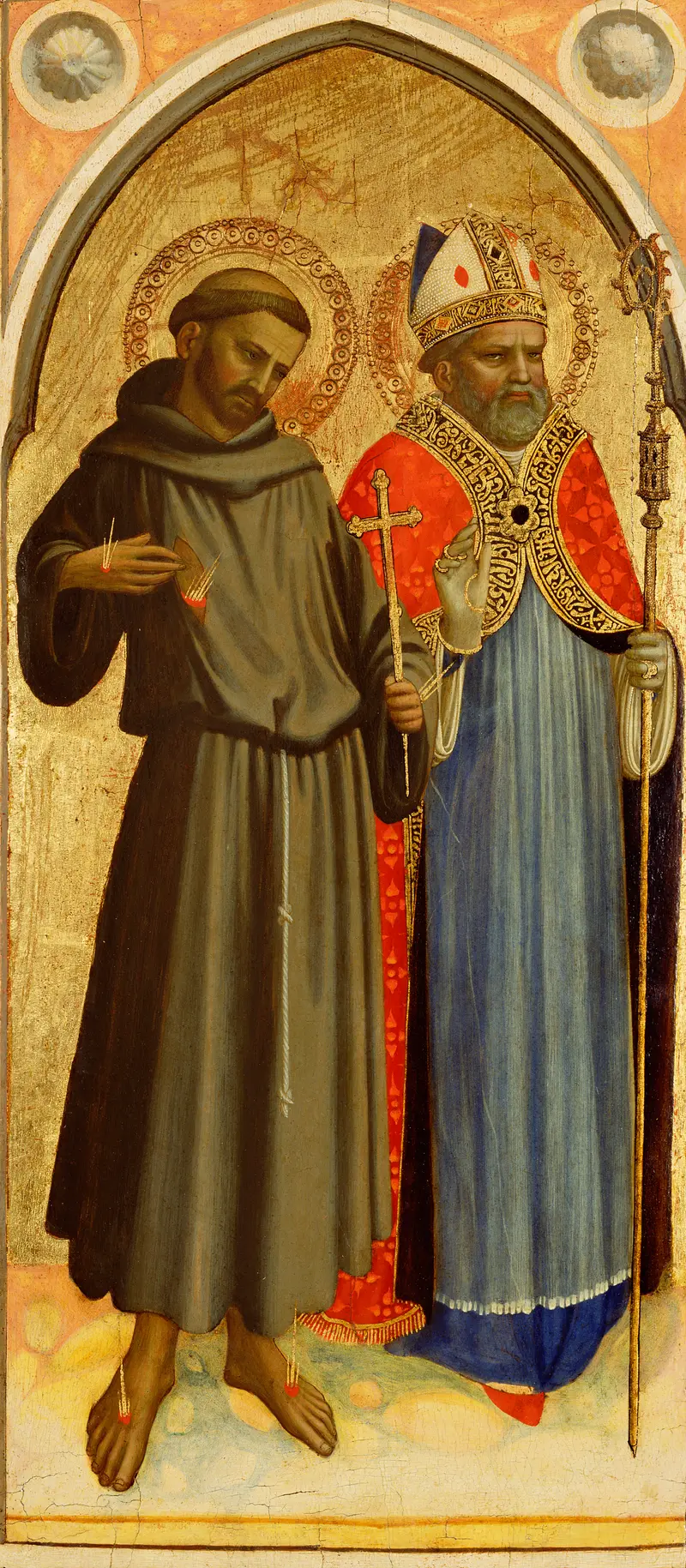 Saint Francis stands beside a bishop saint in a luminous panel by Fra Angelico.