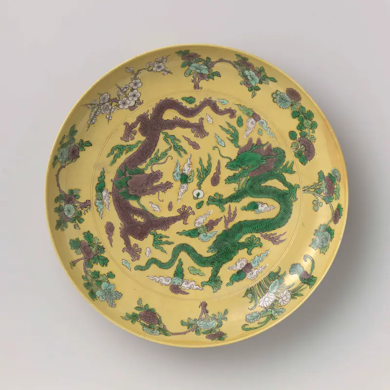 Ceramic saucer-dish with intricate dragons and pearls by Unknown Artist