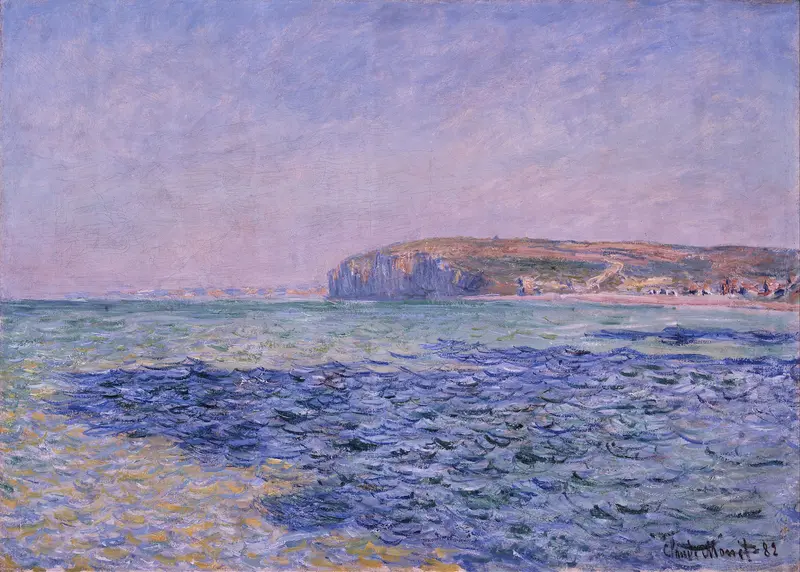 A seascape showing sunlight and shadow on gentle waves with a rugged cliff on the right beneath a lavender, pink, and blue sky.