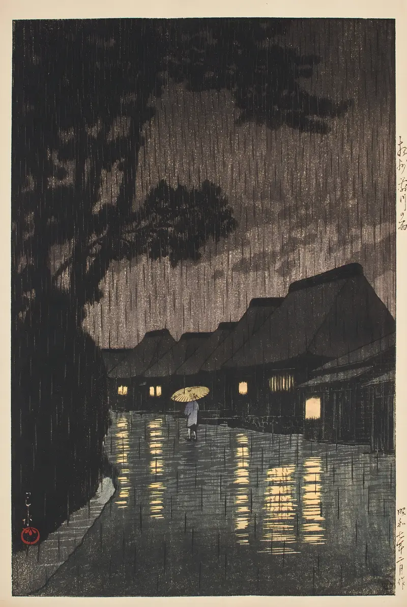 Woodblock print by Kawase Hasui depicting a village in rain at Maekawa, Sagami Province.