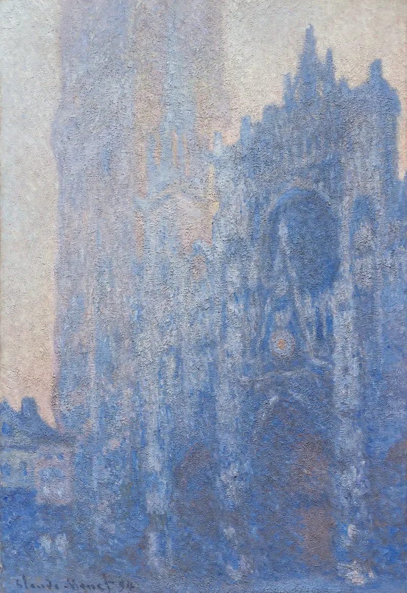 A monumental stone façade and the Tour d’Albane of Rouen Cathedral bathed in cool blue and violet morning light with soft yellow and pink highlights.