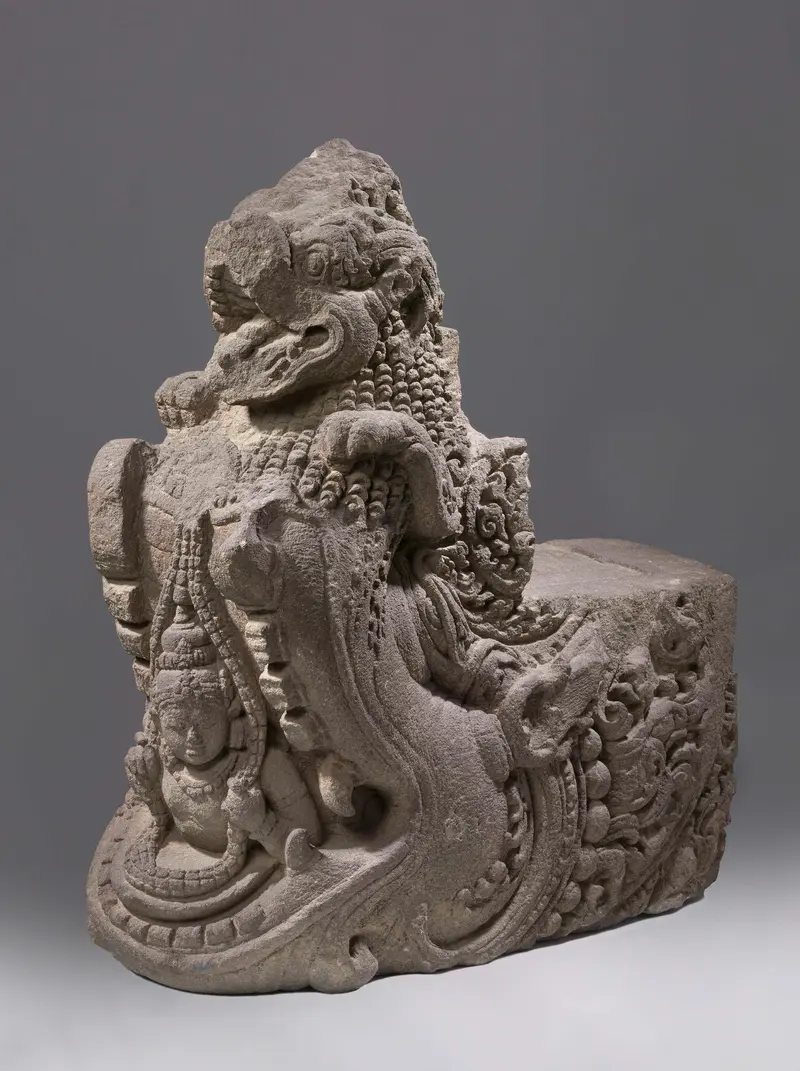 Makara stone sculpture by unknown artist, featuring a mythical creature and a lion.
