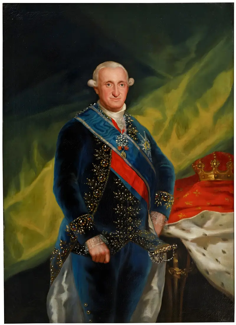 A man in an embroidered dark blue coat with a blue and red sash stands beside a table holding a crown and white ermine-lined royal mantle.