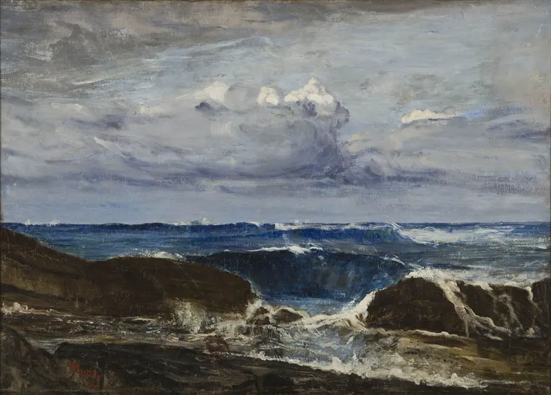A dynamic wave crashing against dark rocks under a heavy sky, capturing the energy of the sea.