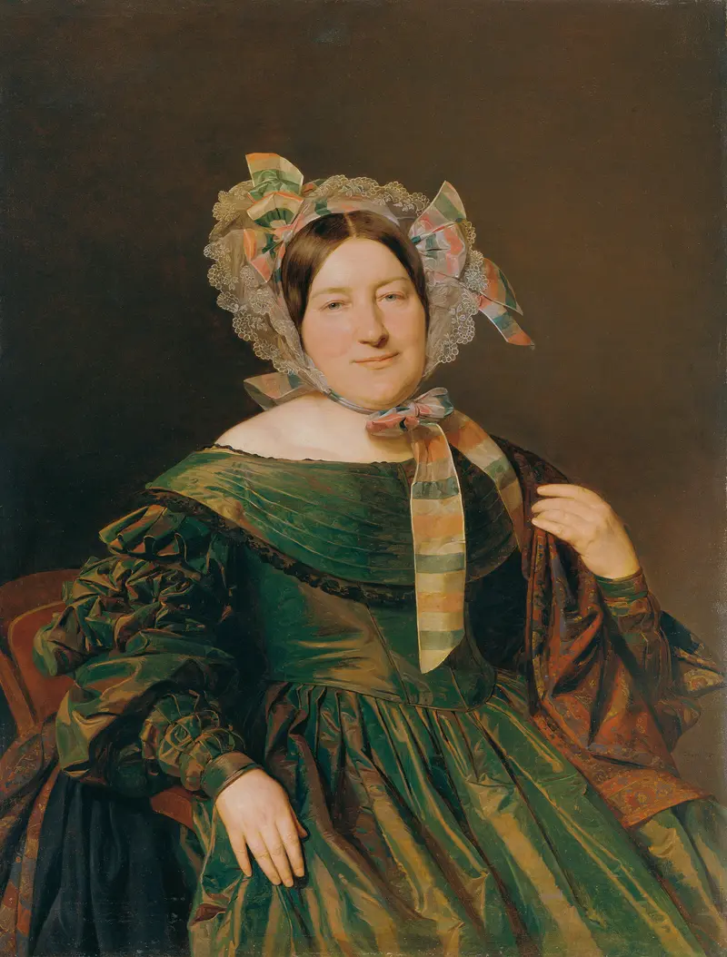 A woman in a green and salmon-colored dress stands gracefully in this portrait by Ferdinand Georg Waldmüller.