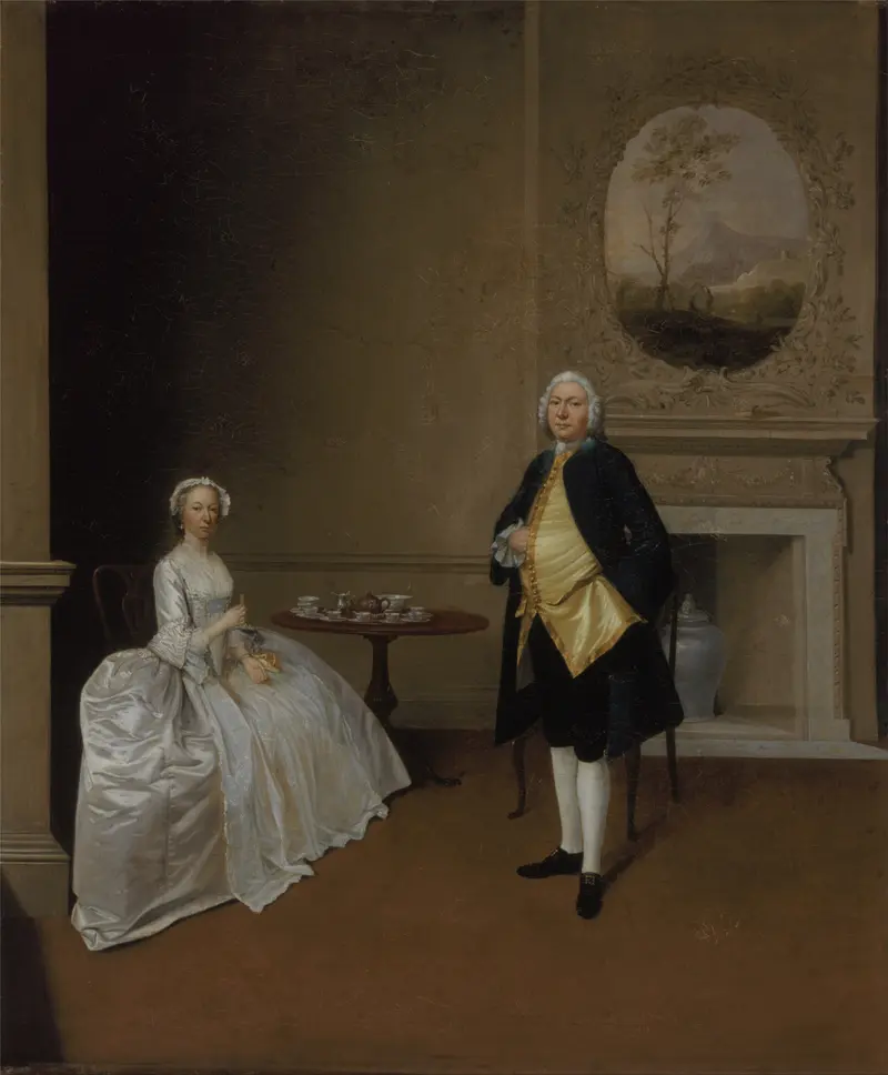 A couple, traditionally identified as Mr. and Mrs. Hill, posed in a room with a teacup and a formal demeanor.