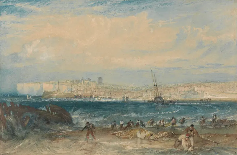 A wide view of Margate’s shoreline with chalk cliffs, buildings, a dark boat offshore, figures working on the sandy beach, and foaming waves under a cloudy sky.