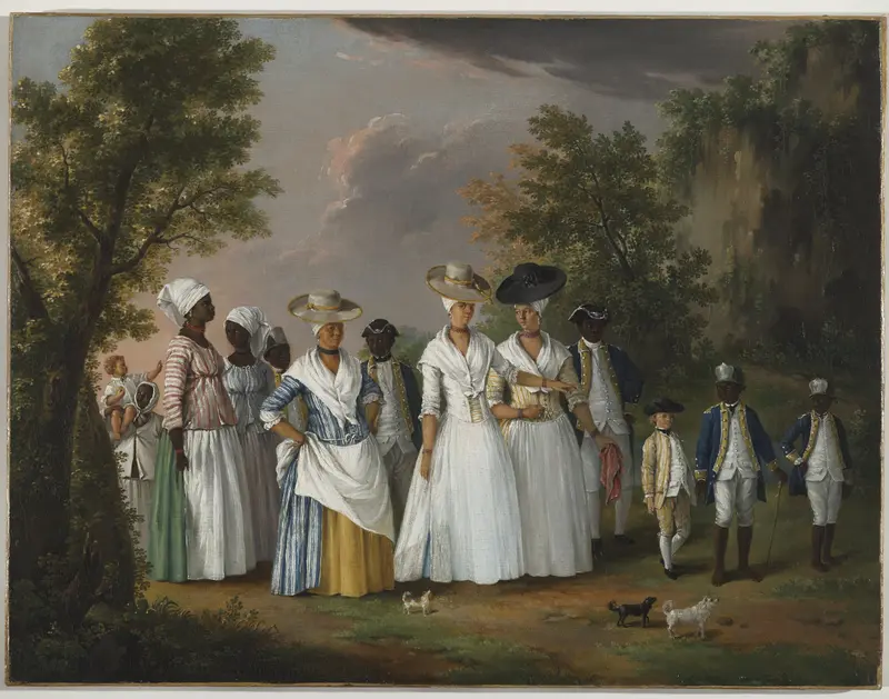 Three confident women in white dresses with hats stand among children and attendants in a lush landscape.