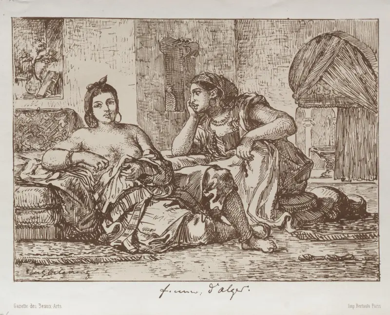 Two women recline side by side on a low divan surrounded by cushions and draped fabrics in a quiet interior.