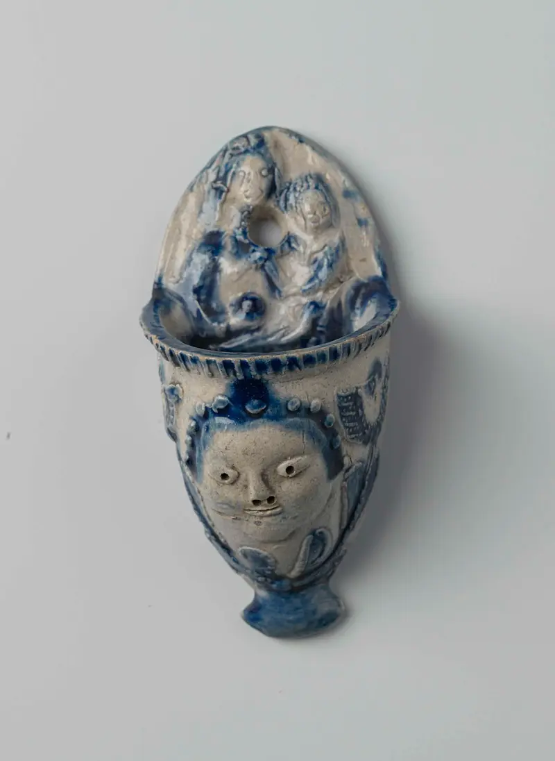 Holy water stoup featuring an angel's head and Madonna and Child, unknown medium, Unknown Artist.