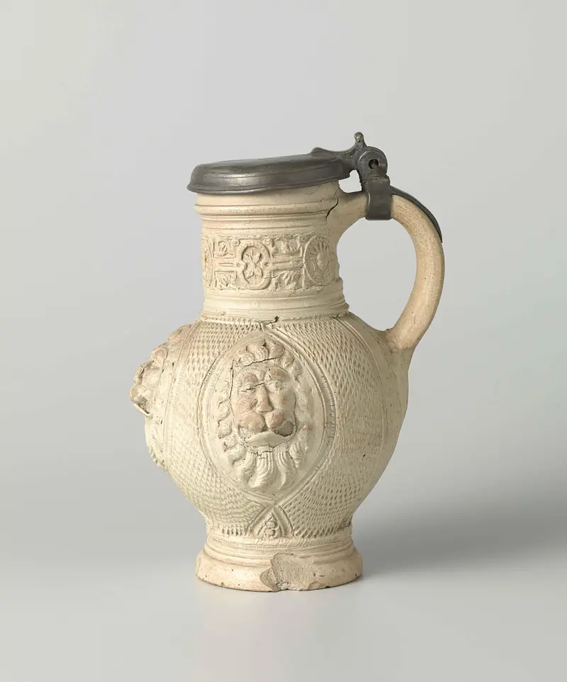 Ceramic jug with three lion heads and masks by unknown artist
