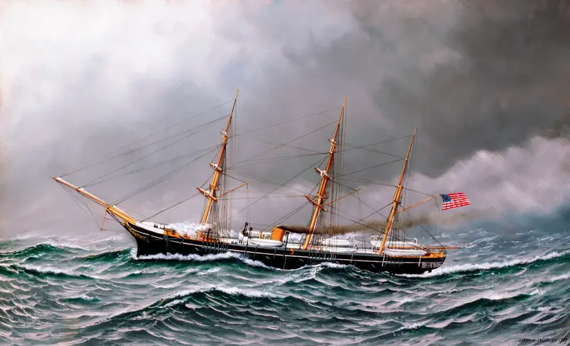 A ship leans into the wind, cutting through waves with an American flag unfurling at the stern.