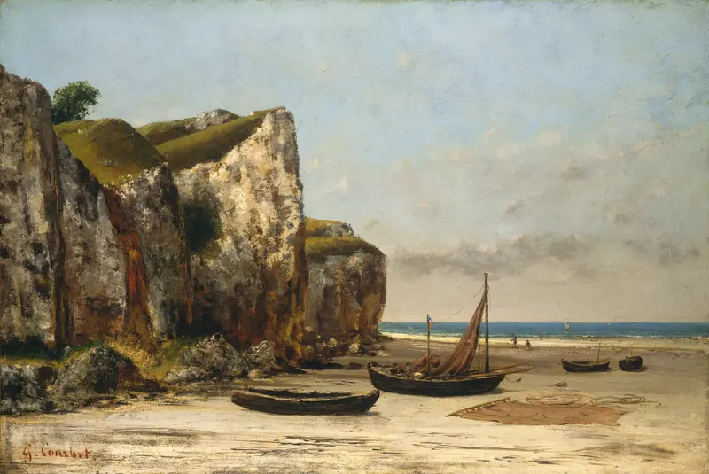 A beautiful seascape depicting the beach in Normandy with gentle waves and soft clouds.