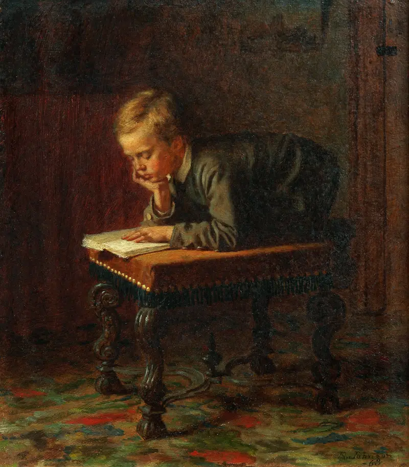 A young boy absorbed in reading, showcasing the charm of everyday life.