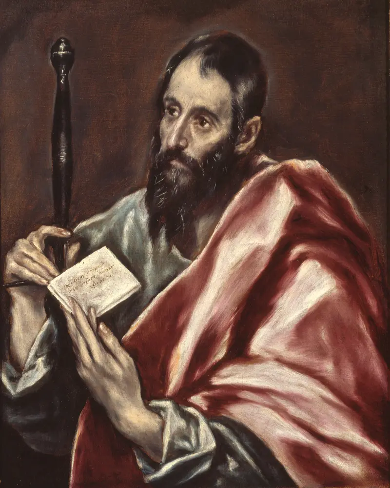 A bearded man in a red and pink cloak holds a staff and a white book, seated against a dark brown background with soft lighting.