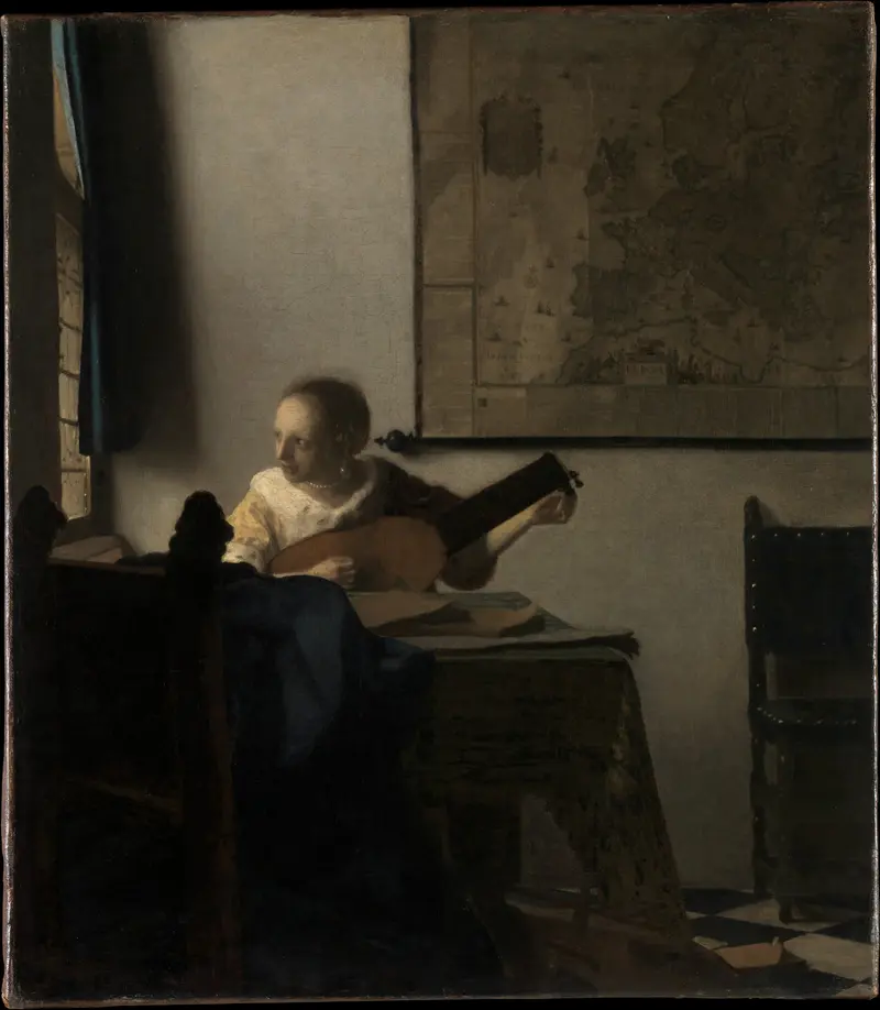 A young woman sits at a table tuning a lute near an open window with a blue curtain, a viola da gamba on the floor, and a dark wooden chair nearby.