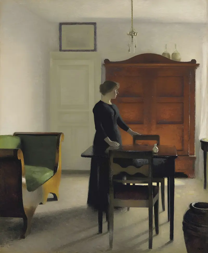 A serene interior scene by Vilhelm Hammershøi featuring soft light and muted colors.