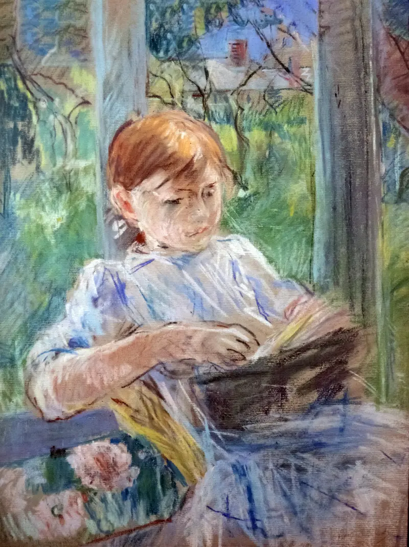 A young girl reading by a window, illuminated by sunlight, with a blurred garden backdrop.