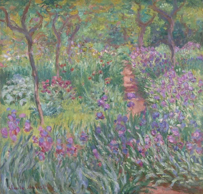 A winding earth path through dense purple and violet irises with four slender tree trunks and dappled sunlight filtering through foliage.