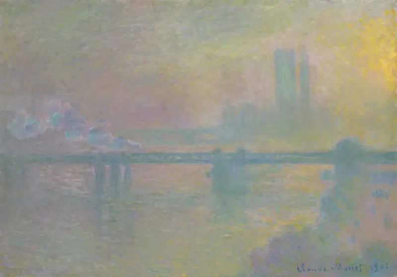 A long blue-green bridge spans across a hazy river with faint silhouettes of buildings and smoke in the background under diffuse pastel light.
