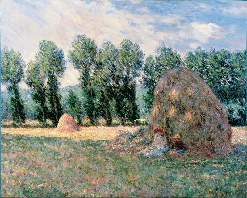 A large ochre and gold haystack dominates the sunlit grassy foreground with a smaller haystack, trees, and a pale blue sky in the background.