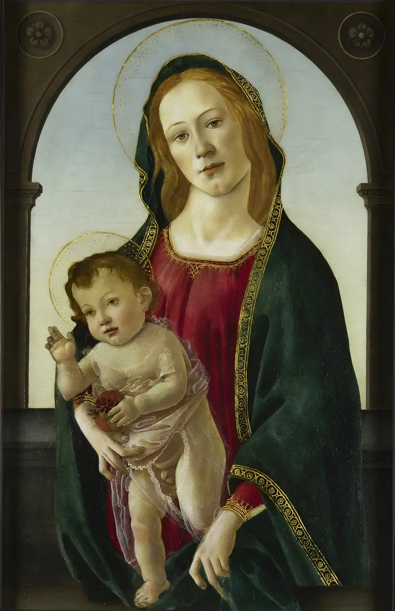 Virgin Mary cradles the infant Jesus, who holds a pomegranate.