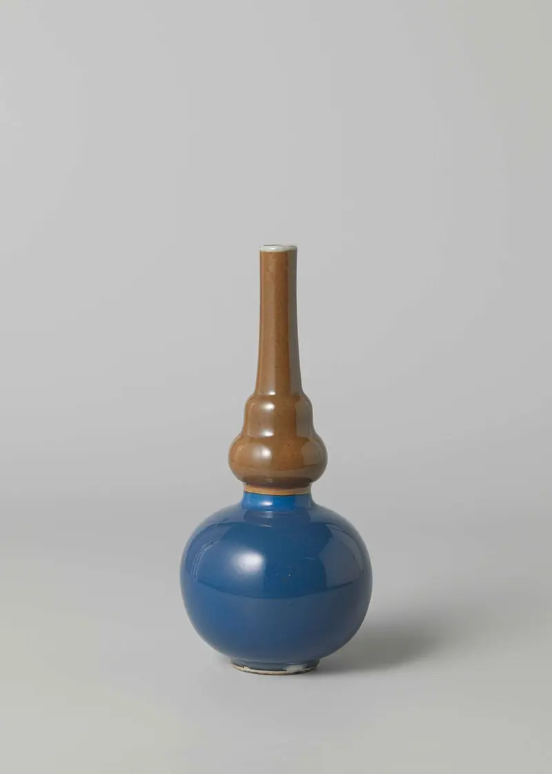 Rosewater sprinkler by unknown artist, decorative vessel in powder blue and light brown.