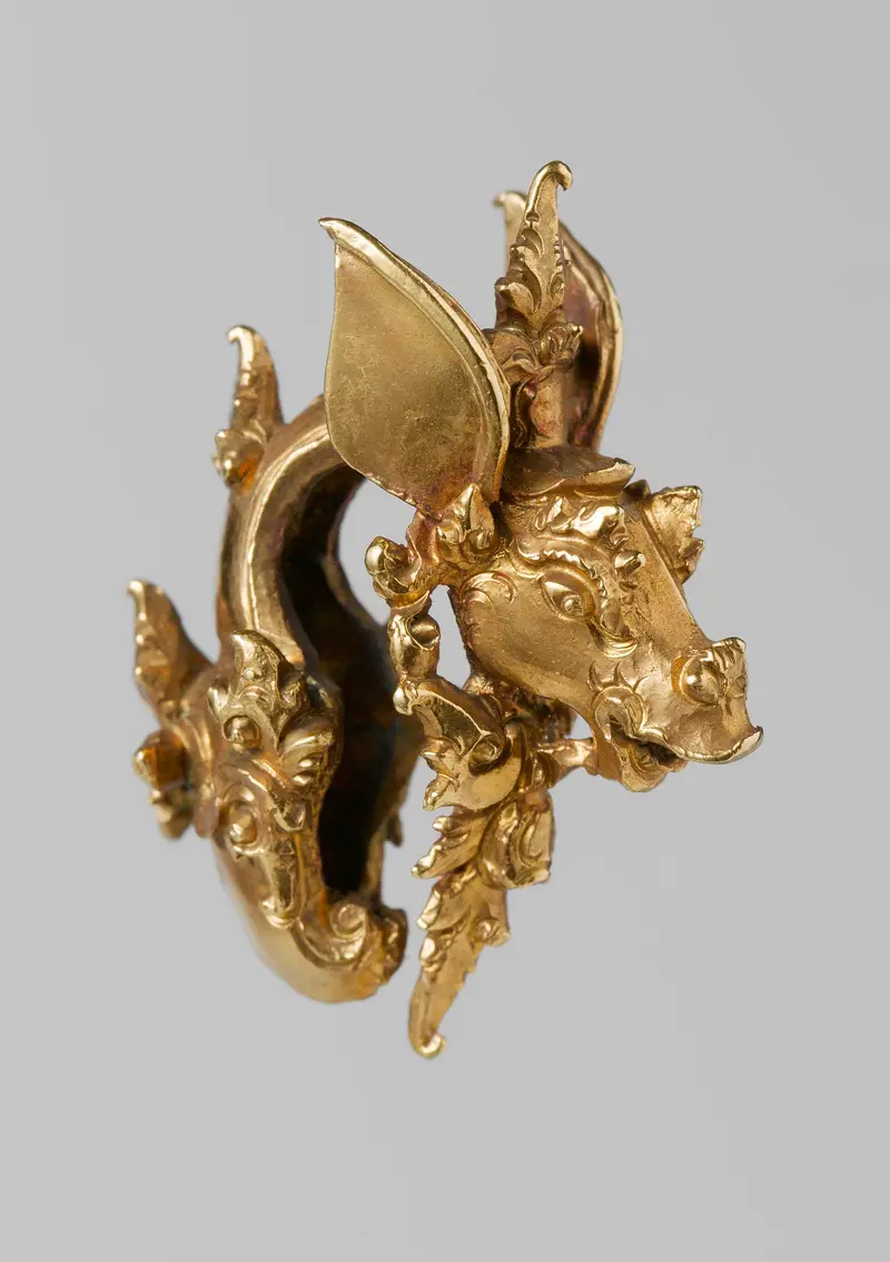 Earring with animal head, metalwork by unknown artist