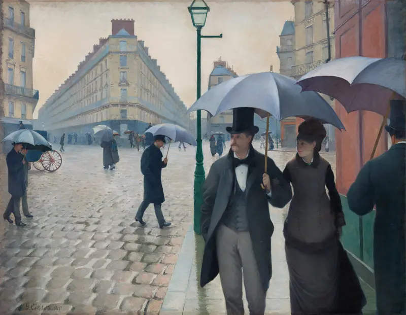A man and woman walk side by side under a large umbrella on a wet Paris street with a green streetlamp and other pedestrians in the background.