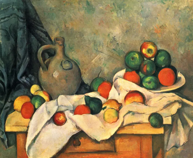 A large earthenware jug stands on a wooden table beside a white cloth and piled fruit, partially shadowed by a dark green curtain.