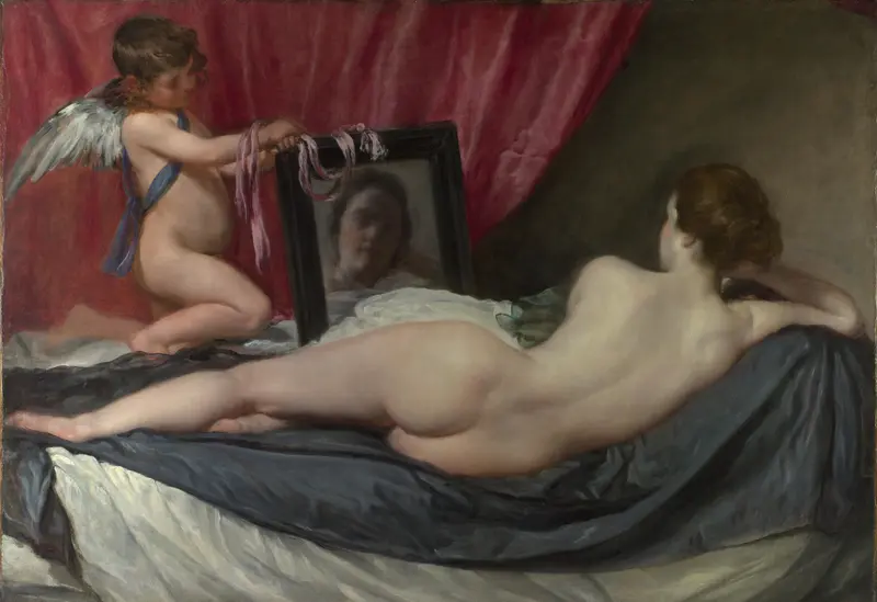 A nude woman lies on her front across a bed with her back to the viewer, her face reflected blurred in a mirror, framed by white and silvery-blue fabrics and a pink curtain.